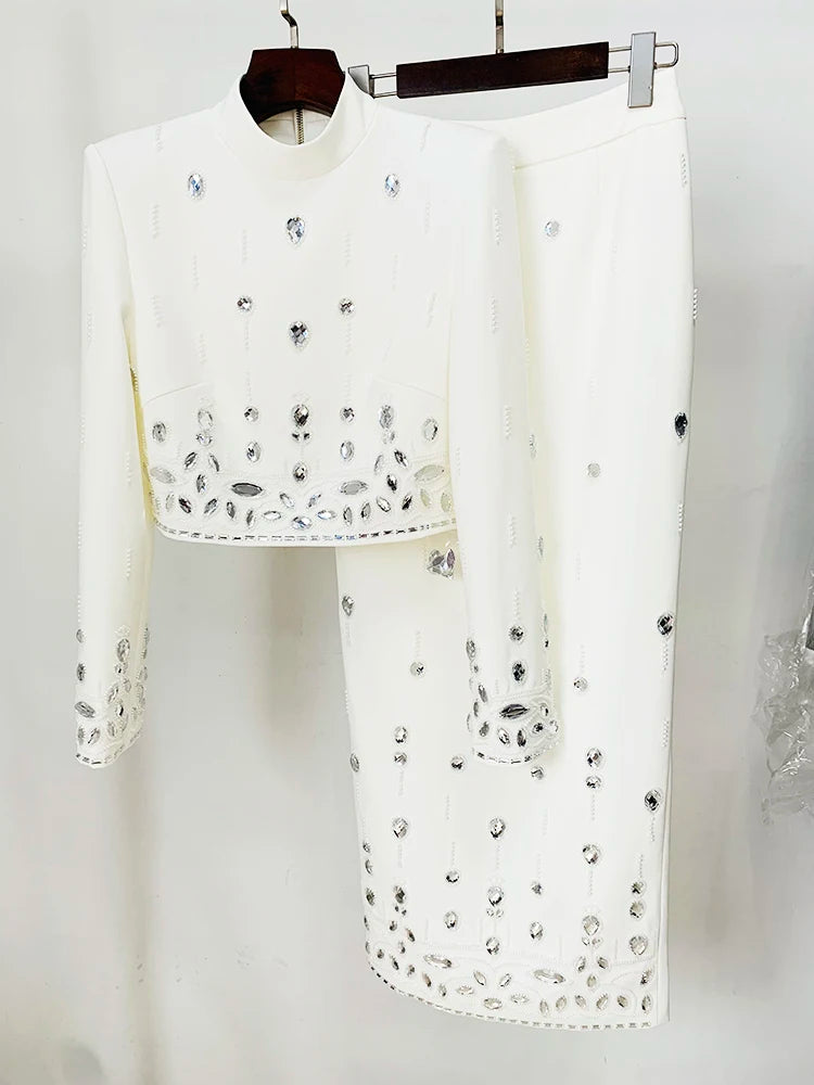 White embellished stand collar cropped jacket and maxi skirt set on hanger