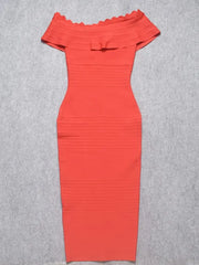 Red off-shoulder dress on a gray background