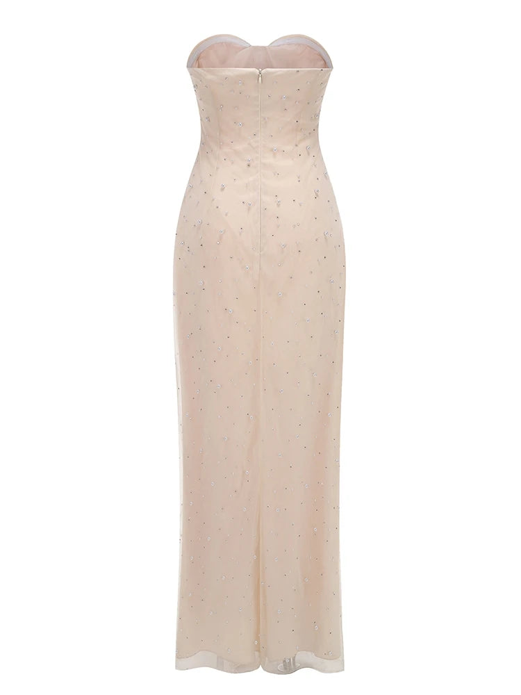 Beige strapless dress with subtle pattern on a white background