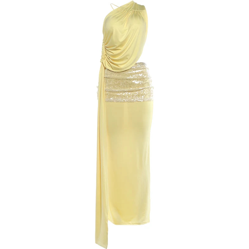 Yellow evening gown with sequin detailing on a white background