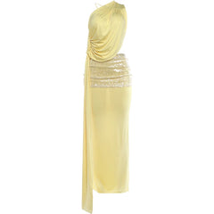 Yellow evening gown with sequin detailing on a white background