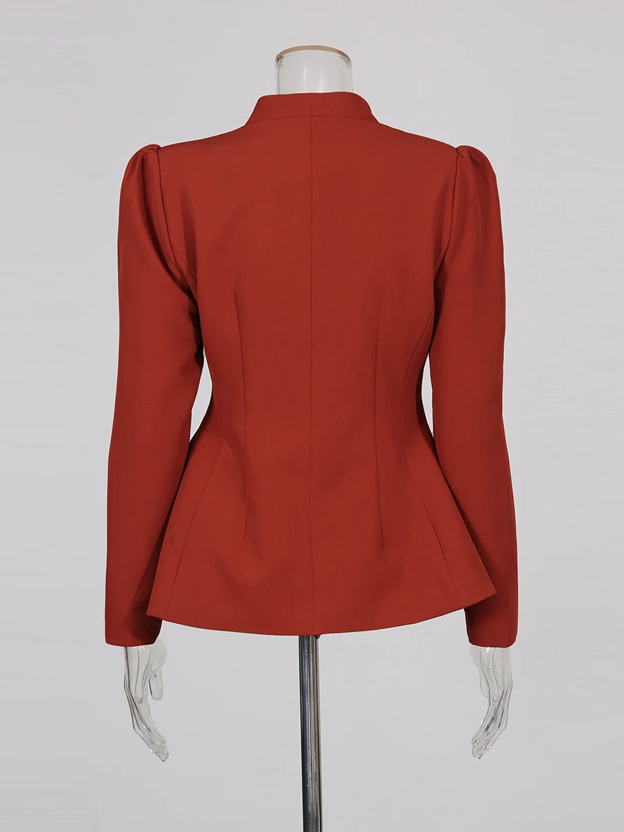 Red peplum jacket on a mannequin against a white background