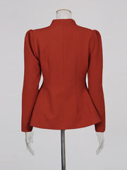 Red peplum jacket on a mannequin against a white background