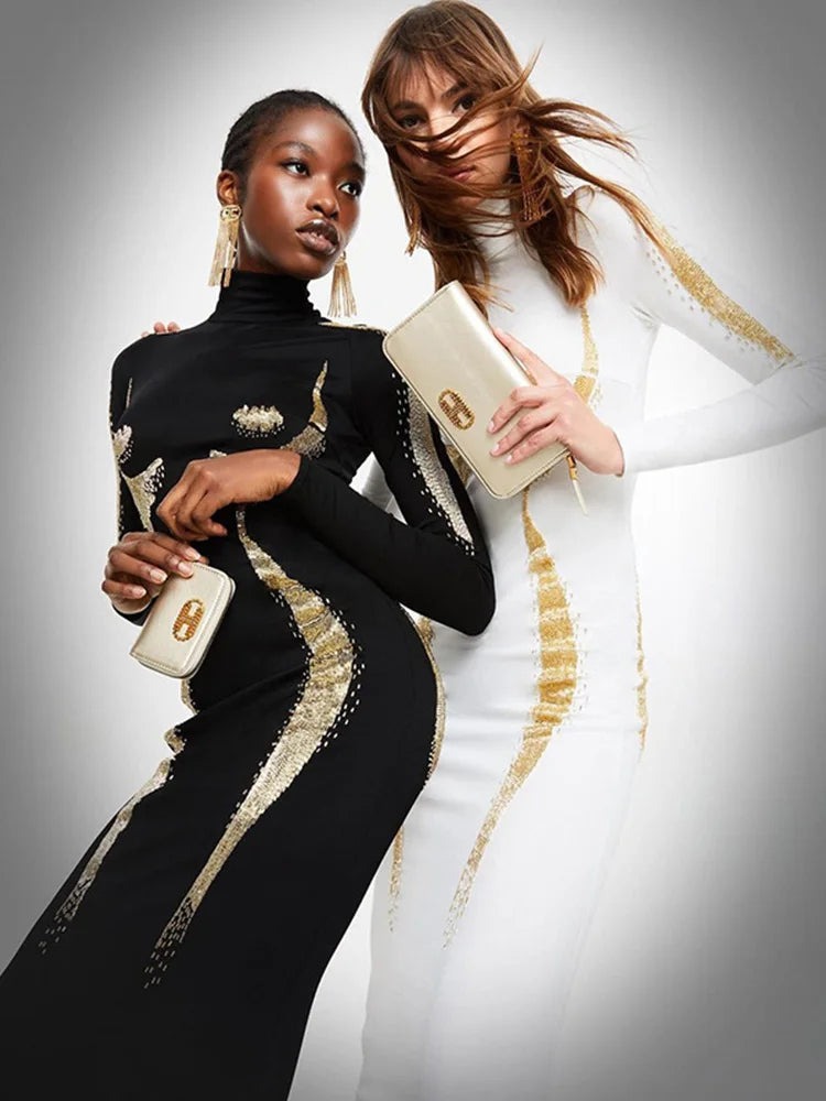 Two models wearing black and white outfits with gold accents, holding handbags.