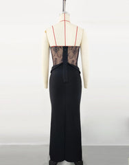 Black dress with sheer lace back on a mannequin against a white background
