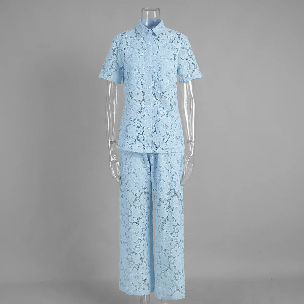 Light blue lace outfit on a mannequin against a gray background