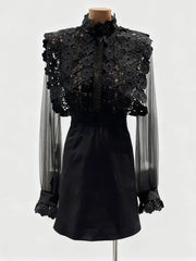 Black lace top and skirt set on a mannequin against a white background