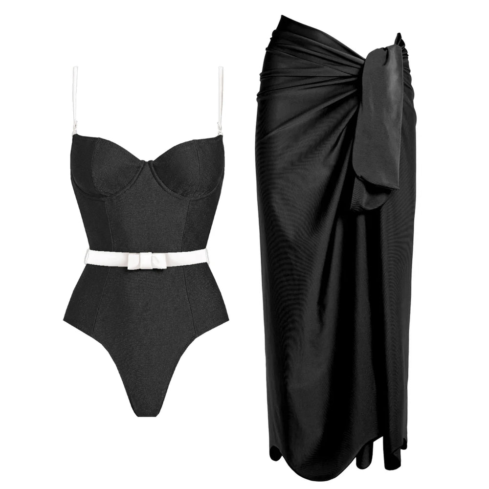 Black one-piece swimsuit with white belt and black wrap skirt