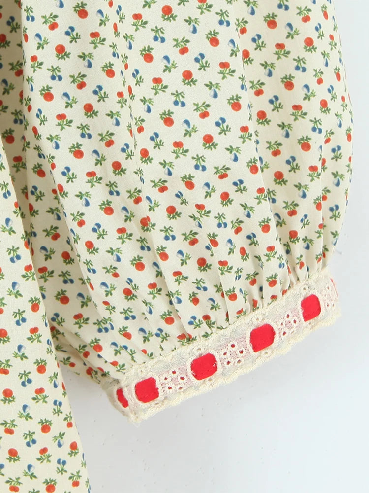 Close-up of the puff sleeve cuff with decorative trim on a mini dress.