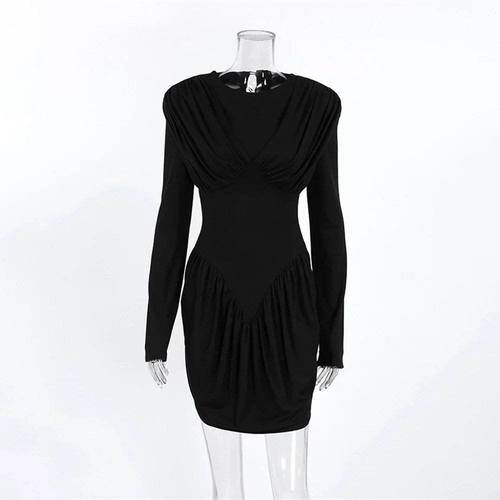Black dress on a mannequin against a white background