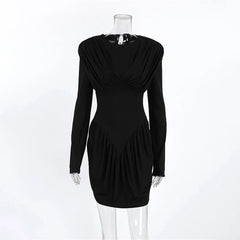 Black dress on a mannequin against a white background