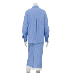 Mannequin wearing a blue striped shirt and pants set on a white background