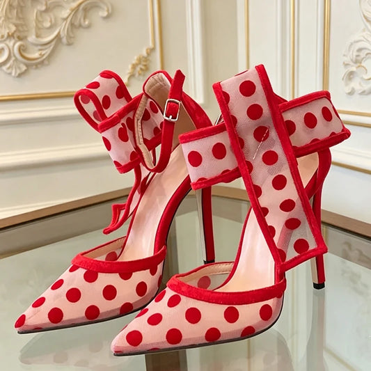 Polka dot mesh stiletto heels with red bow detail