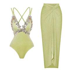 Sparkling embellished swimsuit with crisscross straps and twisted maxi skirt.