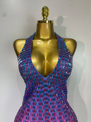 Close-up of halter neckline on crystal embellished bodycon mini dress