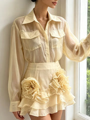 Back view of the sheer organza top and ruffle skirt set