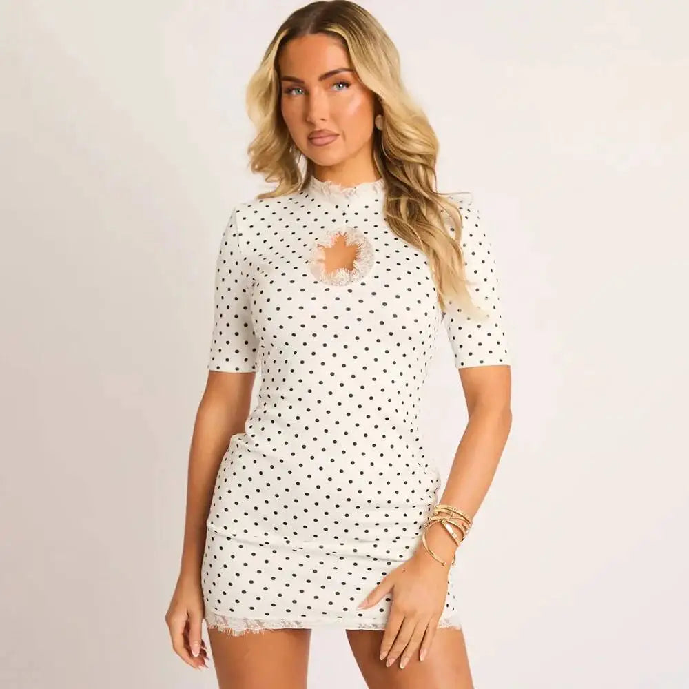 White polka dot mock neck lace trim mini dress