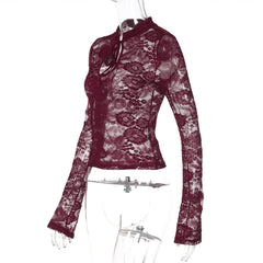 Maroon lace top on a mannequin against a white background