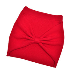 Red skirt with a large bow on a white background