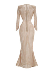 Beige evening gown with long sleeves on a white background