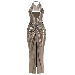 Metallic halter neck dress with a front slit on a white background