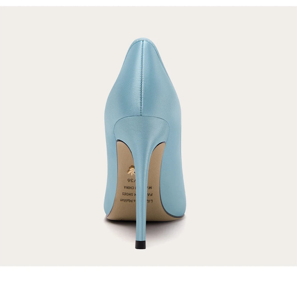 Light blue high-heeled shoe on a white background