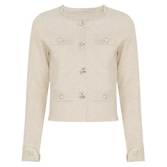 Beige knit cardigan with sparkling jewel buttons and trim