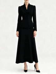 Black suit with a skirt on a white background