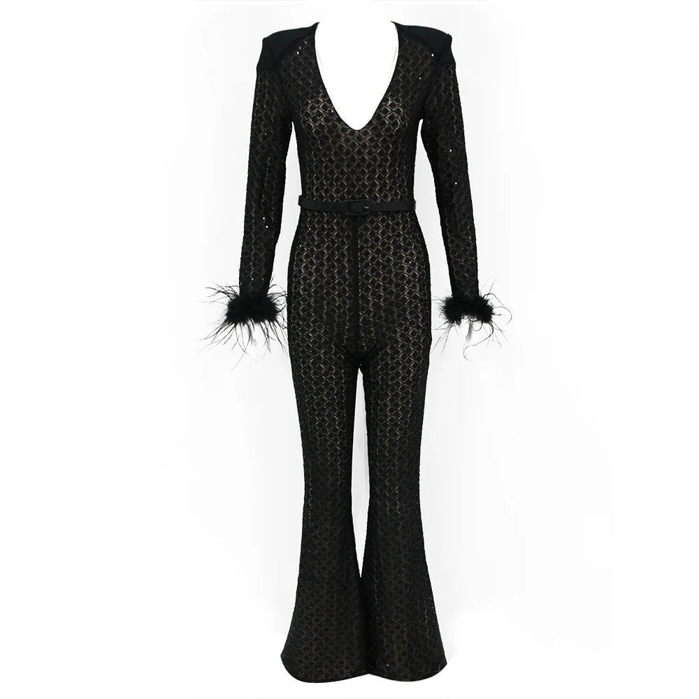 Black patterned jumpsuit with feathered cuffs on a white background