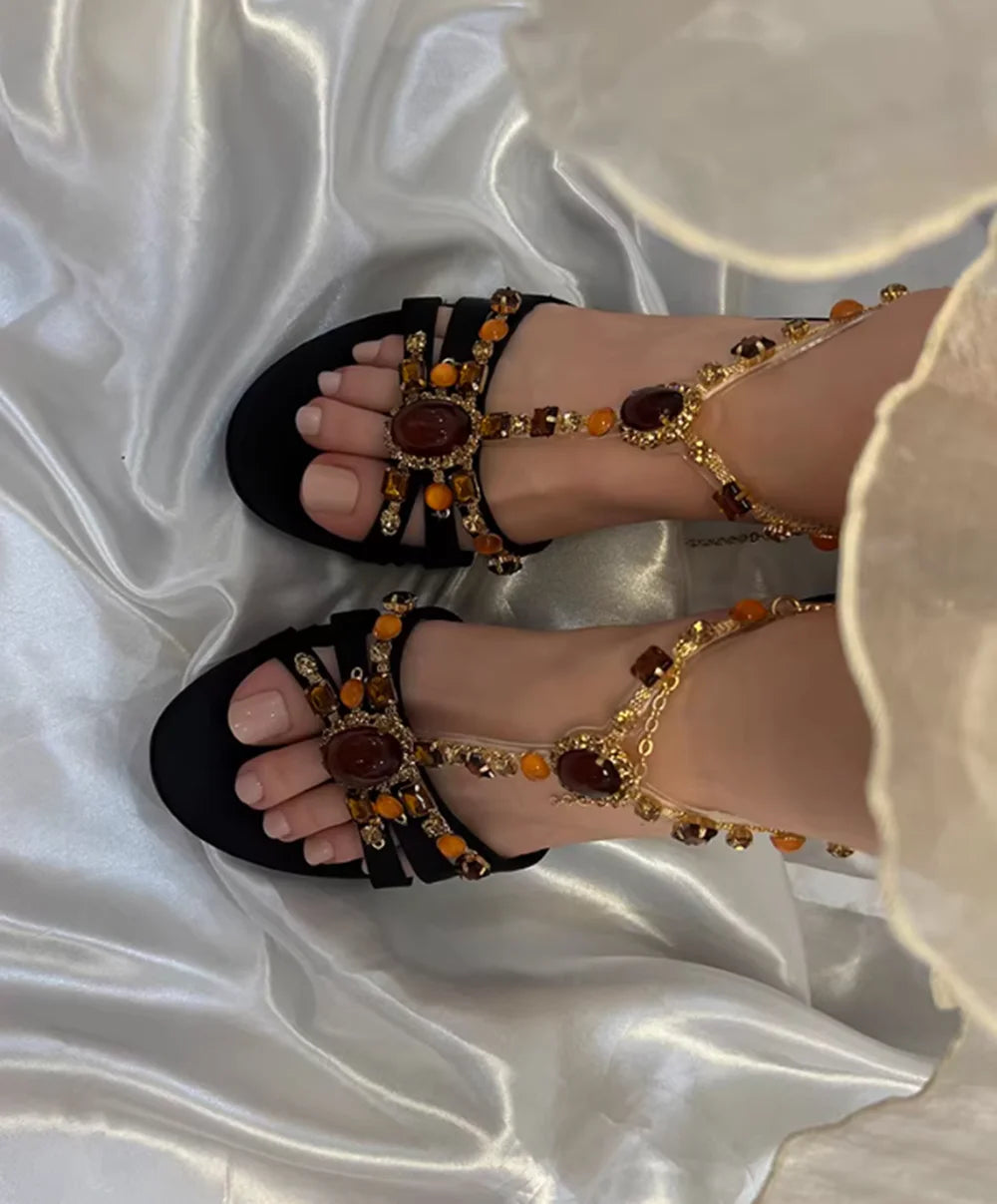 Overhead view of beaded embellished t-strap stiletto heels