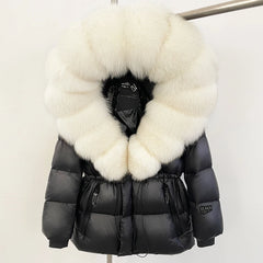 Black puffer jacket with large white fur collar on a mannequin against a white background