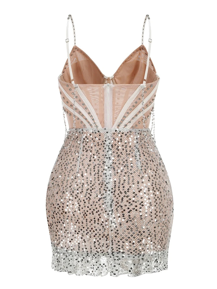Beige sequin dress with thin straps on a white background