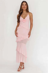 Pink spaghetti strap maxi dress with rose embellishment and ruffles