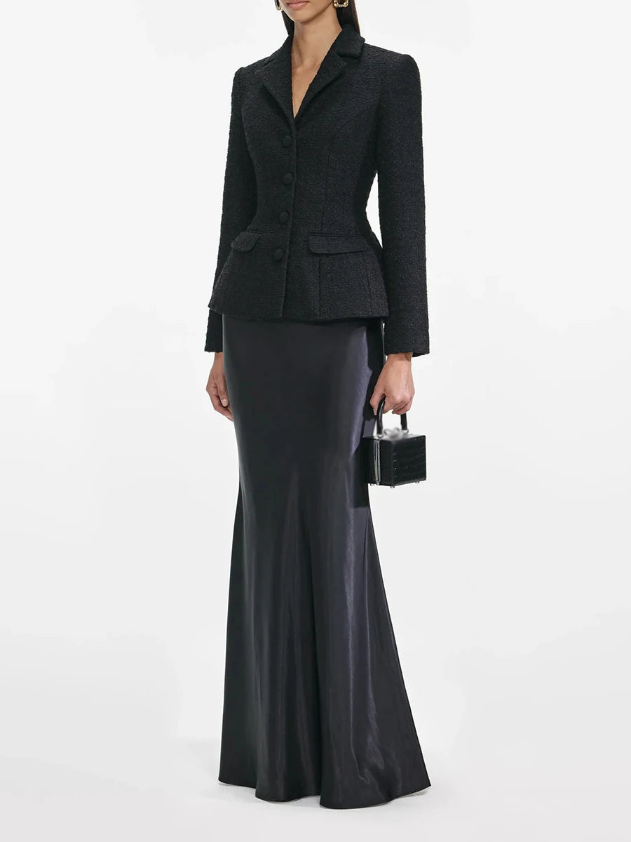 Two-piece evening set with structured blazer and flared skirt