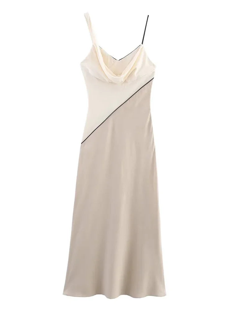 Beige dress with black accents on a white background