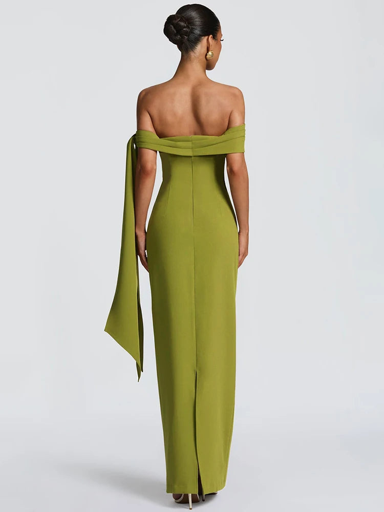 Woman wearing a green off-shoulder gown