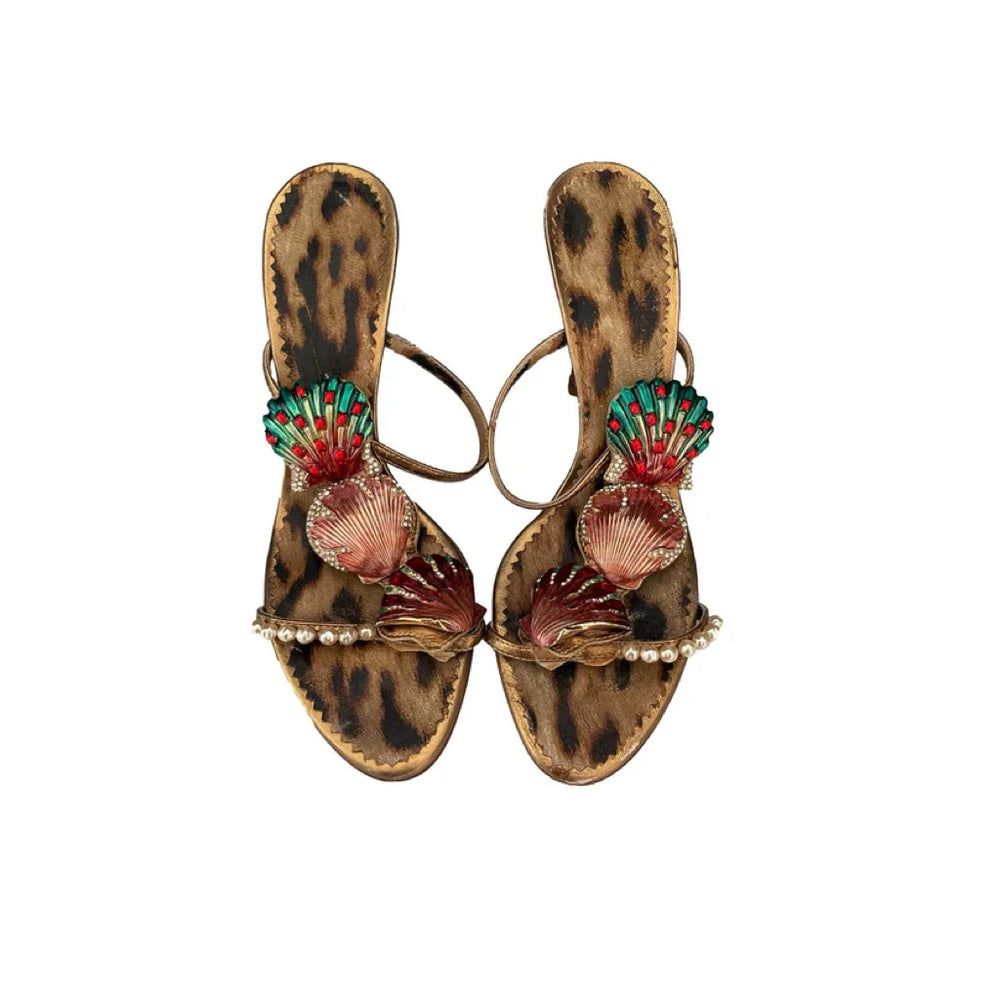 Top view of seashell embellished stiletto heel sandals with leopard print