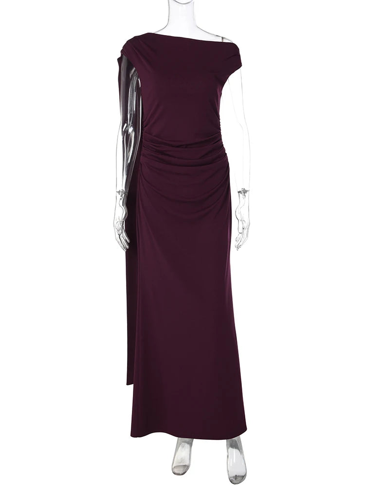 Maroon evening gown on a mannequin against a white background