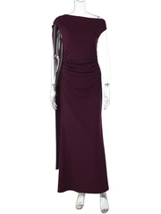 Maroon evening gown on a mannequin against a white background