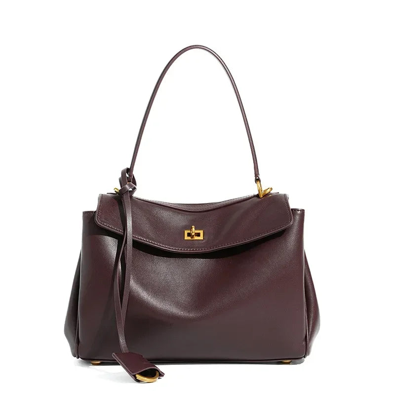 Soft leather Kelly-style tote with gold lock and top handle