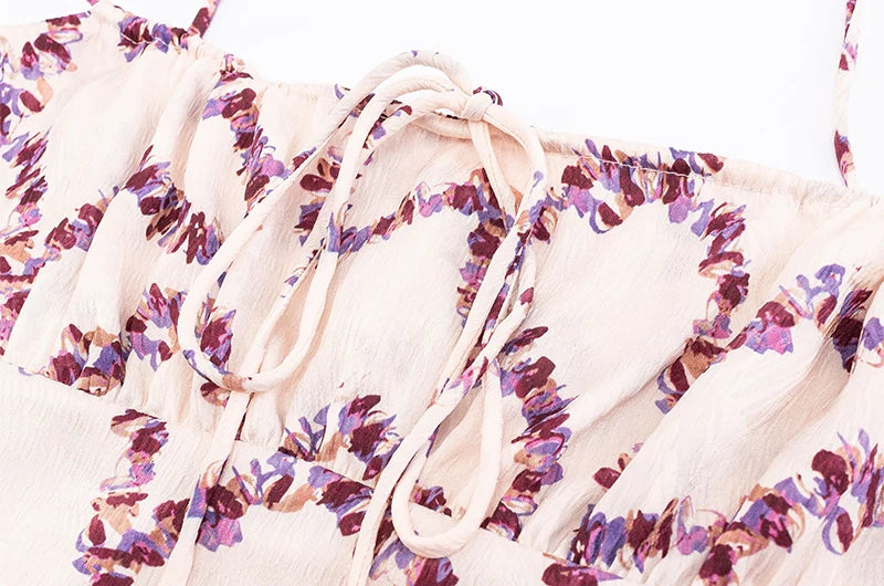 Detail of tie-front and pattern on square neck A-line dress