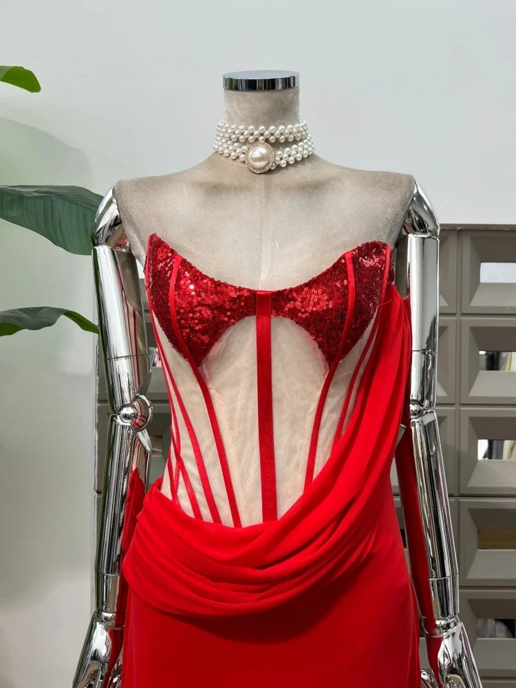 Red dress on a mannequin with a white background