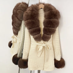 Cream knit cardigan with brown fur trim and belt