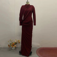 Maroon evening gown on a mannequin against a plain background