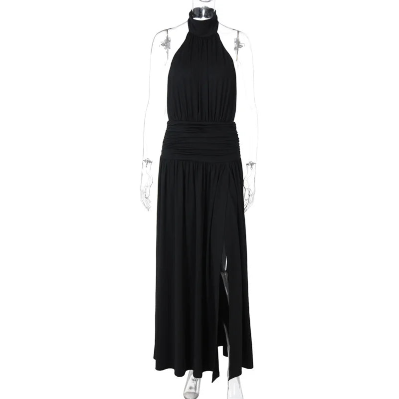 Black halter neck dress on a mannequin against a white background