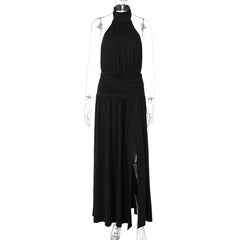 Black halter neck dress on a mannequin against a white background