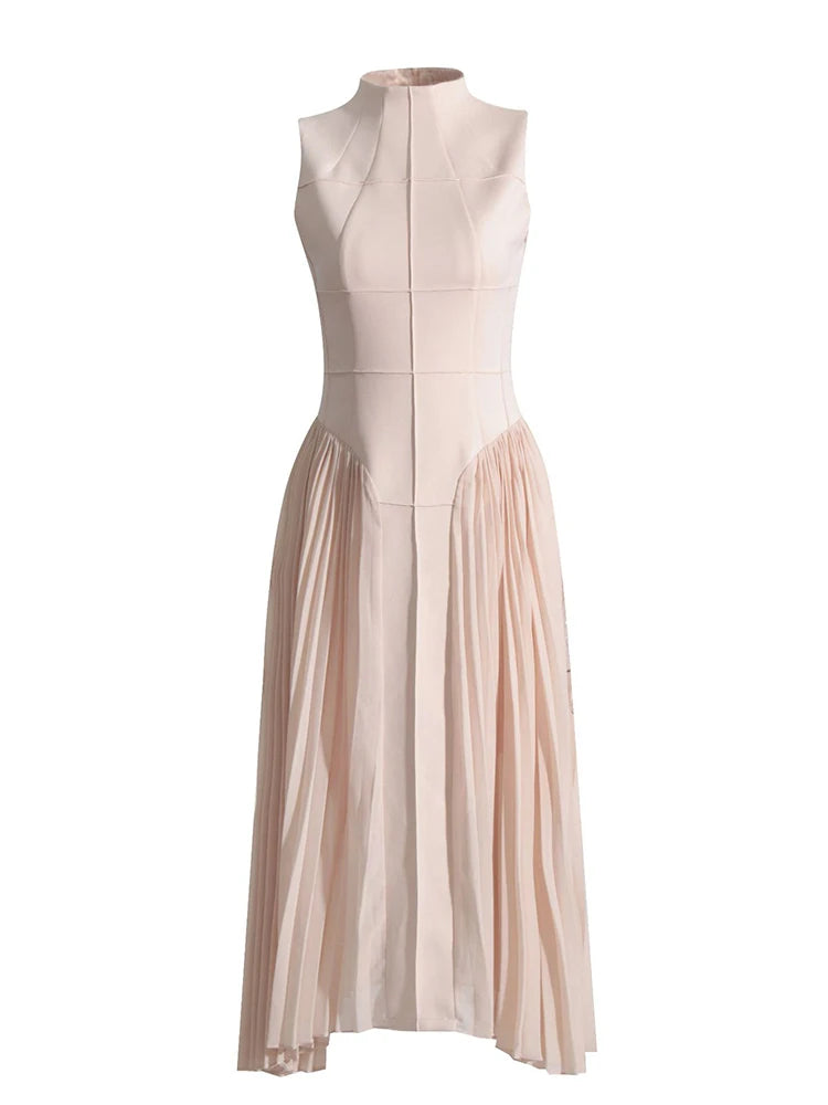 Beige sleeveless dress with a pleated skirt on a white background