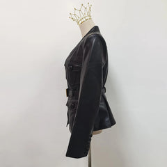 Black leather jacket on a mannequin with a gold crown against a white background