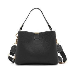 Black handbag with a strap on a white background