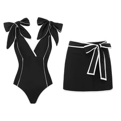 Black off-the-shoulder bow swimsuit and wrap skirt set